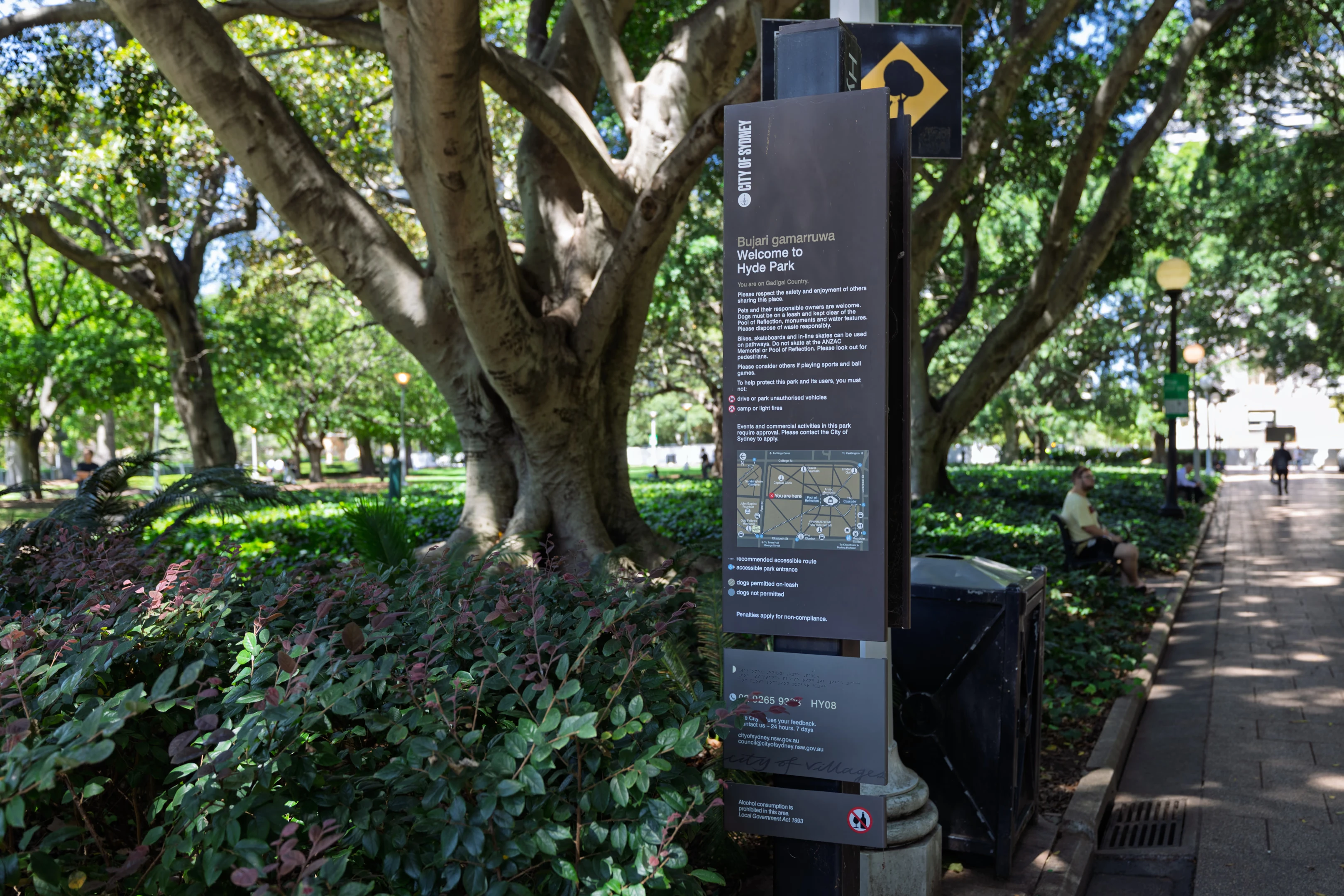 A tall sign with heading ‘Welcome to Hyde Park’