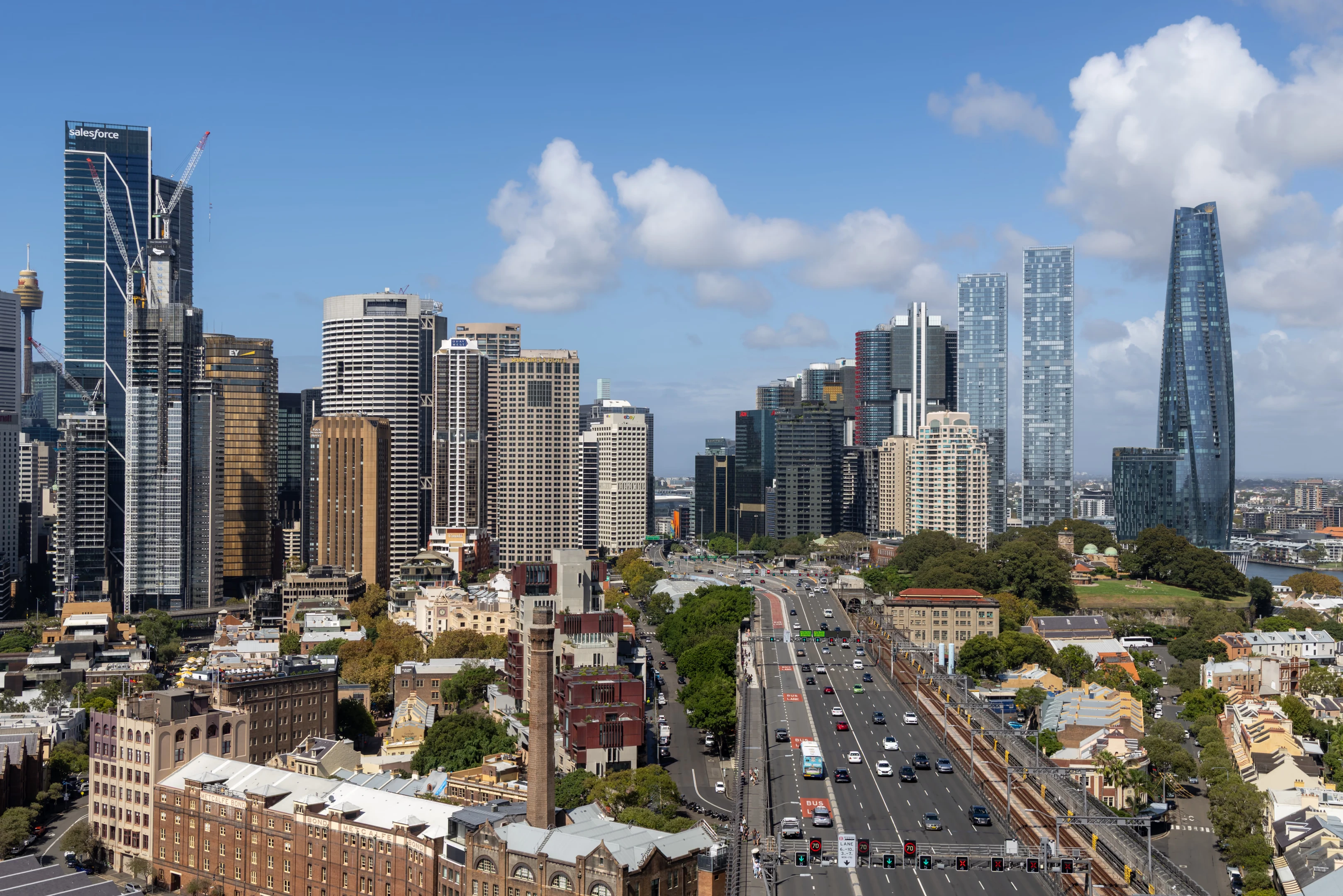 Bradfield Highway and Cahill Expressway, and nearby skyscrapers including Crown Sydney and Salesforce Tower