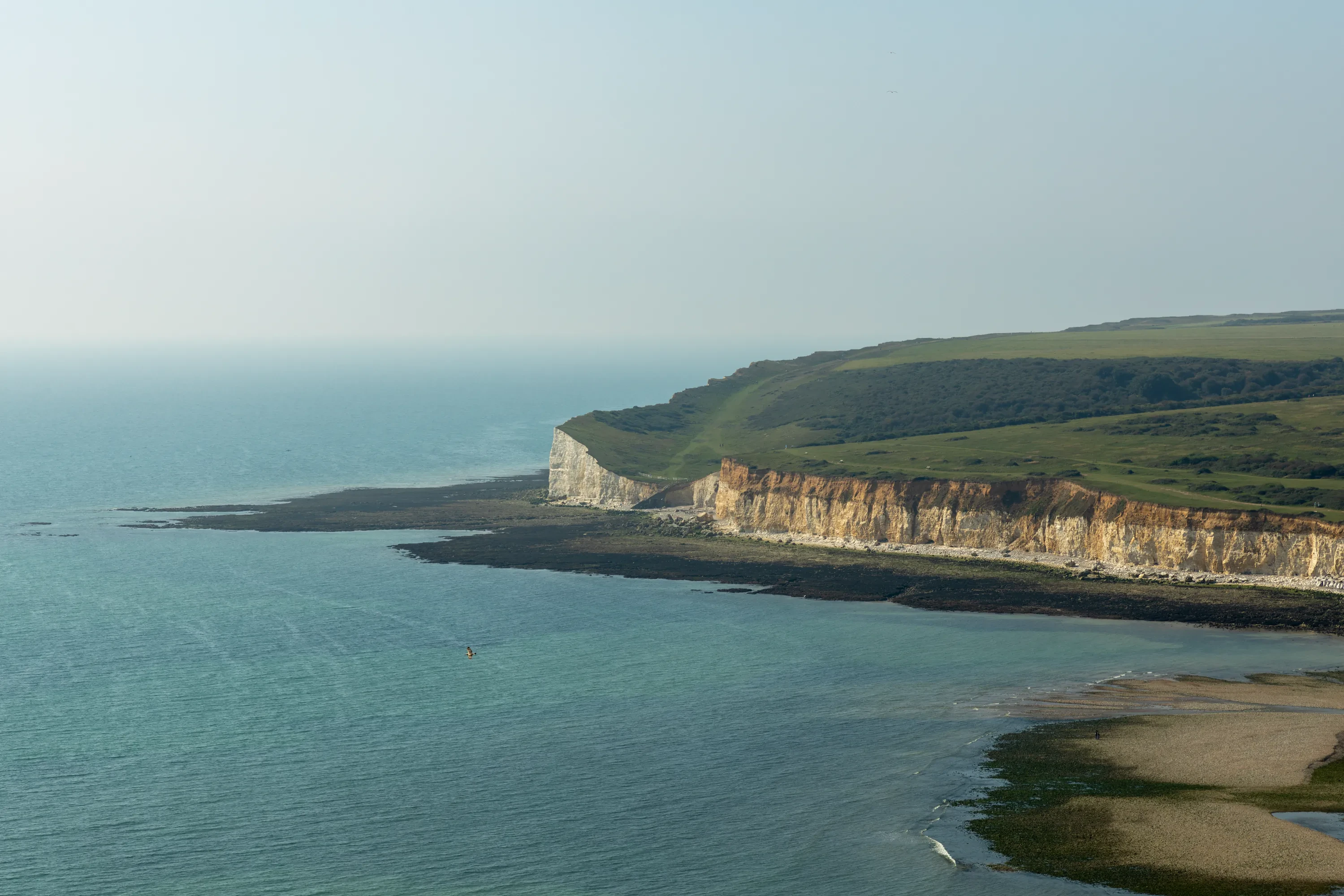 A photo of the sea and chalk cliffs