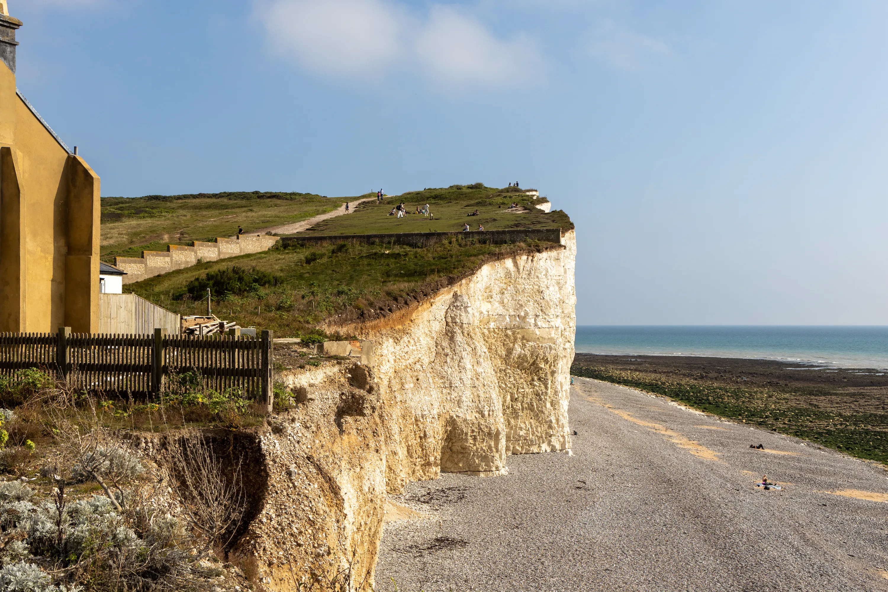 A photo of a chalf cliff and shingle beach