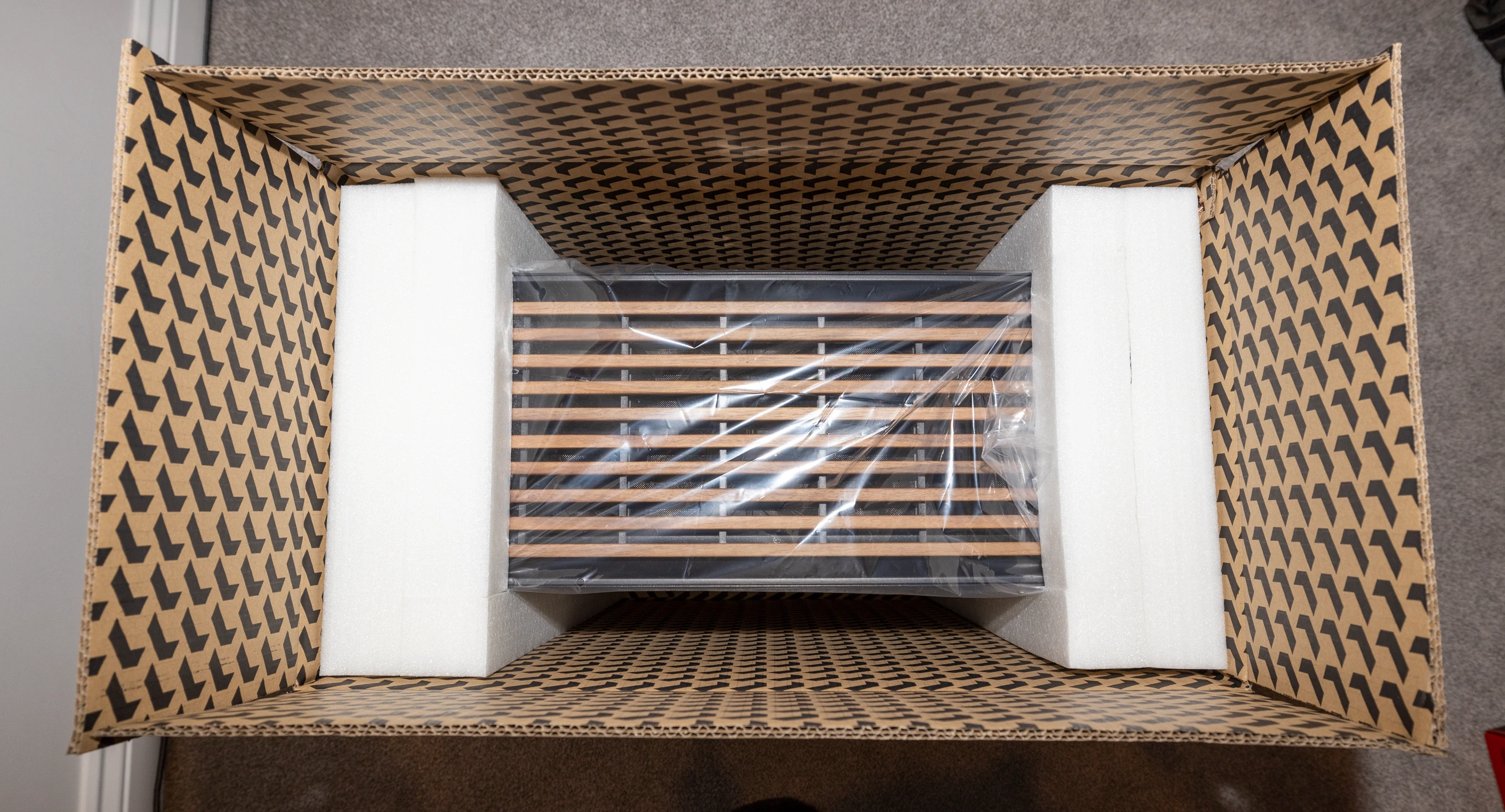 A Fractal Design North case in its box.