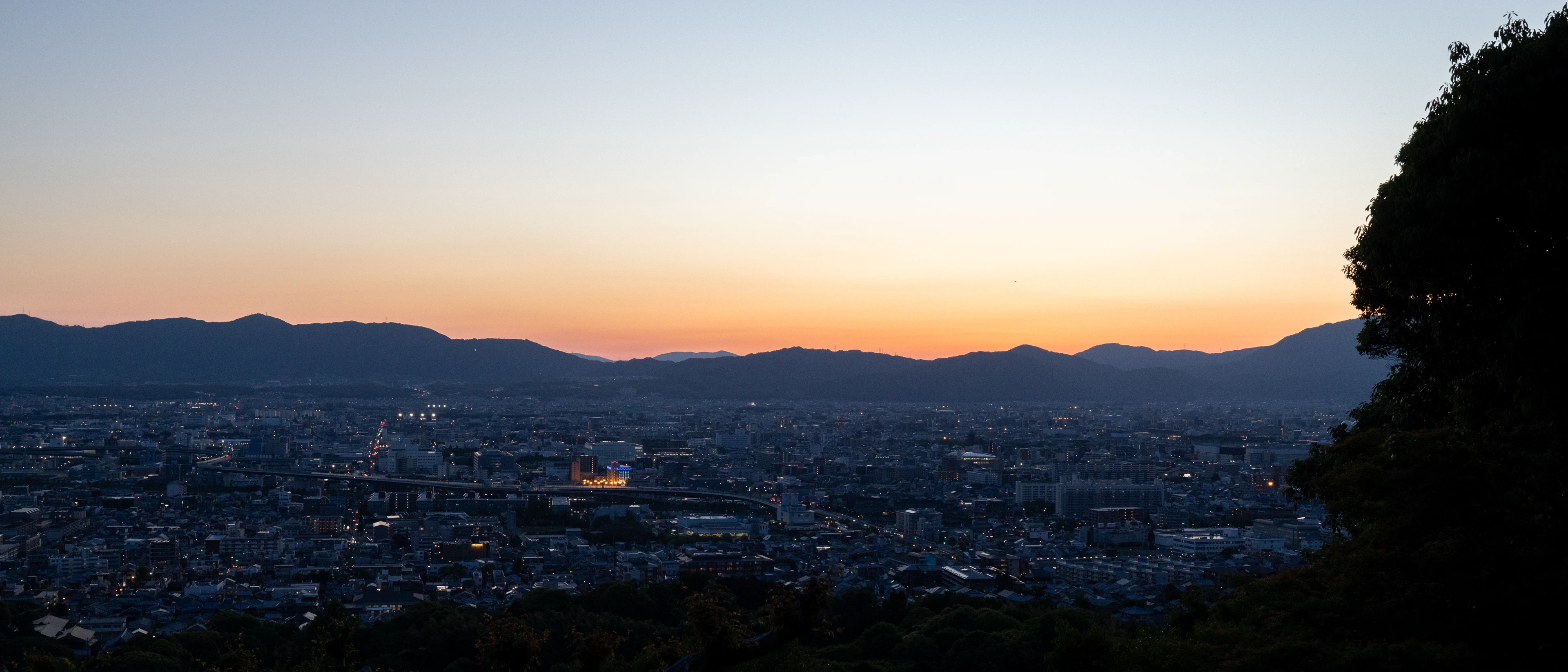 A photo of Kyoto from high ground, just after sunset