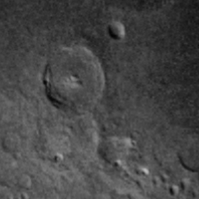 A crop of the blue channel of an input image, converted to greyscale It’s shifted slightly up and left compared to the green channel.