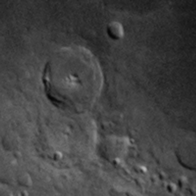 A crop of the green channel of an input image, converted to greyscale. It’s shifted slightly up and left compared to the red channel.