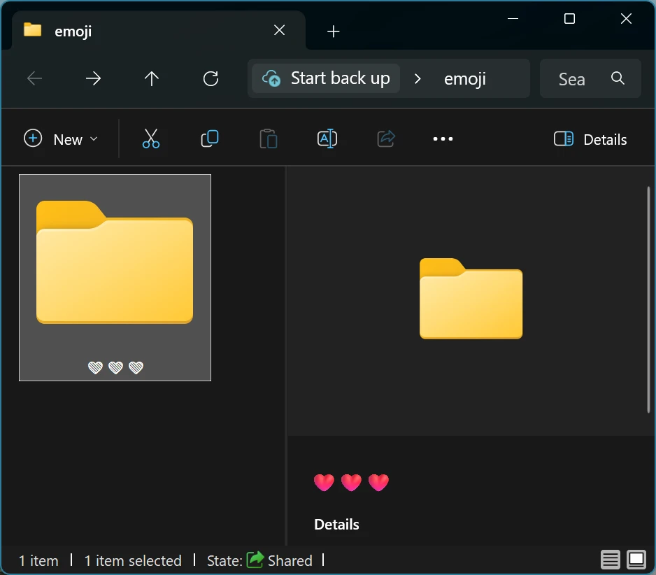 A screenshot of File Explorer showing three monochrome hearts in the main items area and three colour hearts in the details pane
