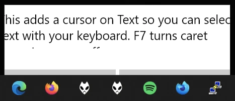 A dialogue box asking to turn on caret browsing, but over a taskbar item context menu, and with all sides cut off.